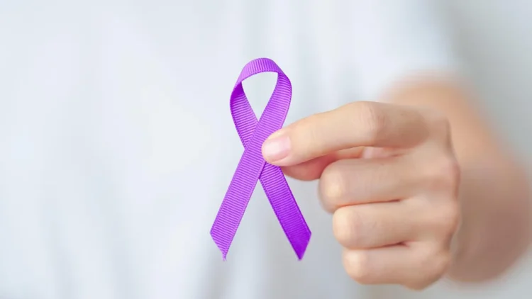 Unveiling the Cooktown 10 Model 1 Purple Ribbon Held By Hand