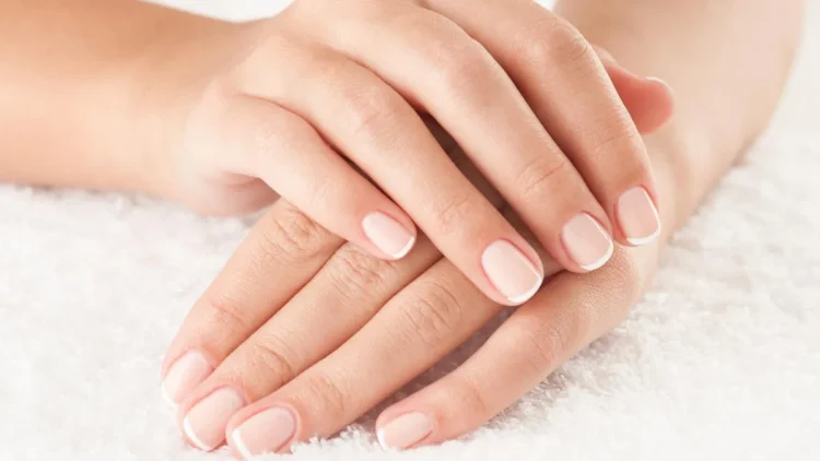 Your Fingernails Are Speaking - Are You Listening ? 1 Female Hands Close Up Crossed On White Towel